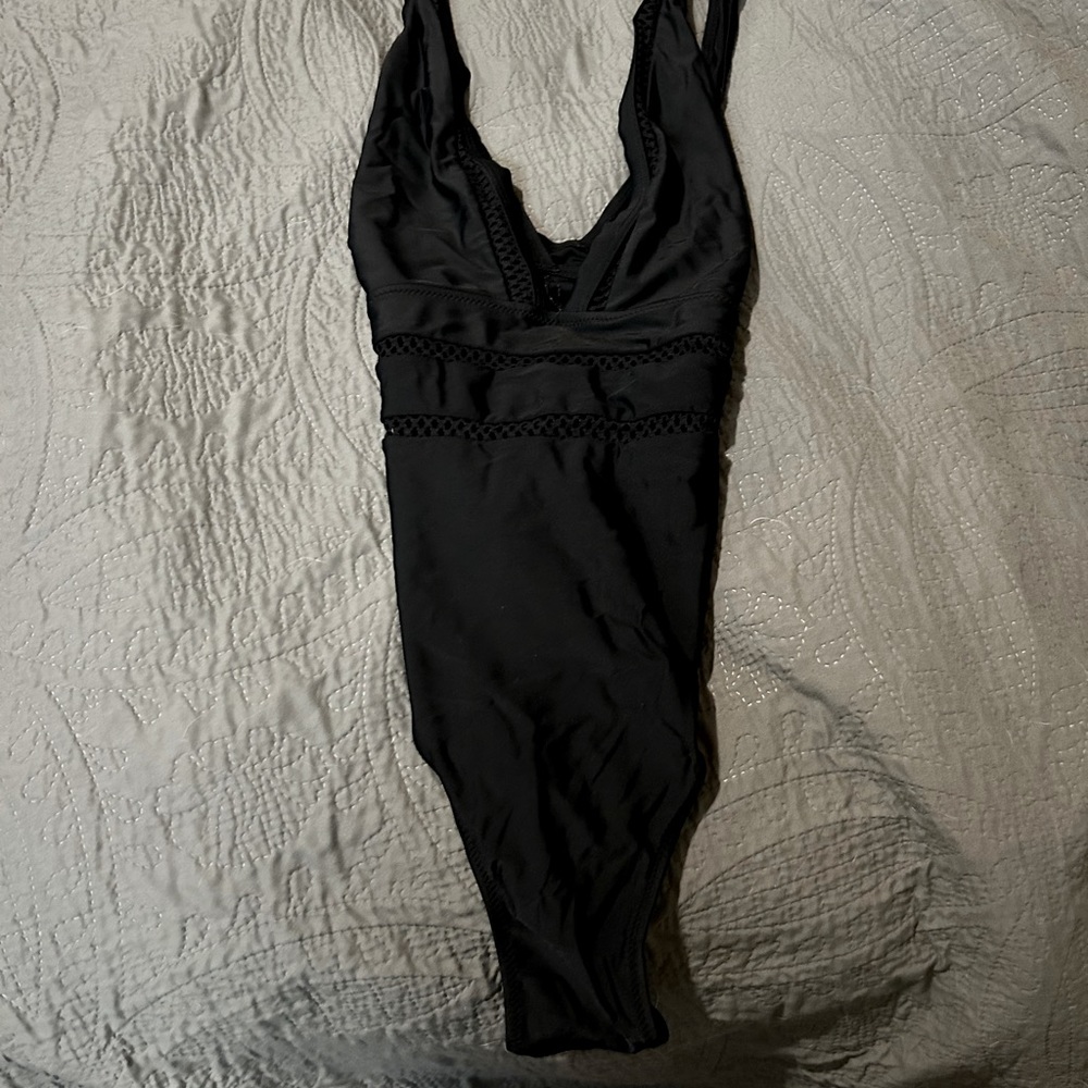 One piece swimsuit.